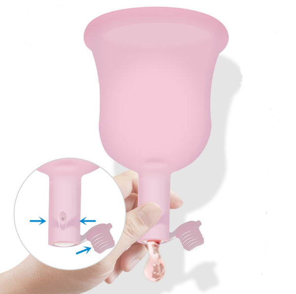 Dischargeable menstrual cup