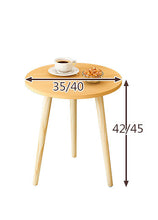 Mesa de centro redonda pequeña para el hogar.