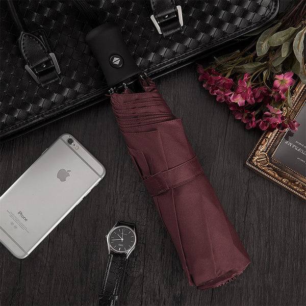 Paraguas plegable automático de goma negra de doble propósito resistente a los rayos UV